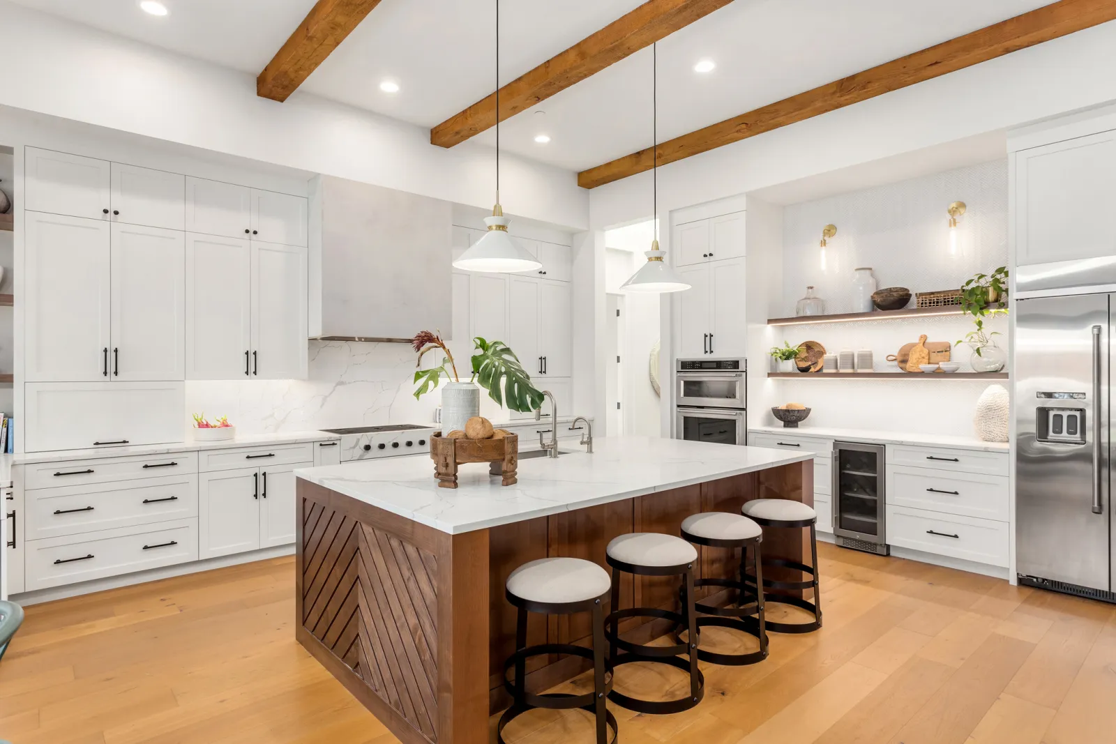 White kitchen with timber beams